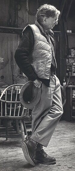 Sperry Andrews standing in the big studio at Weir Farm, about 1987